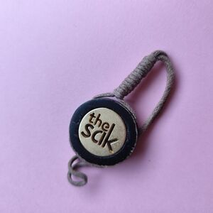 3/$20💗The Sak Black and Gray Bag Charm